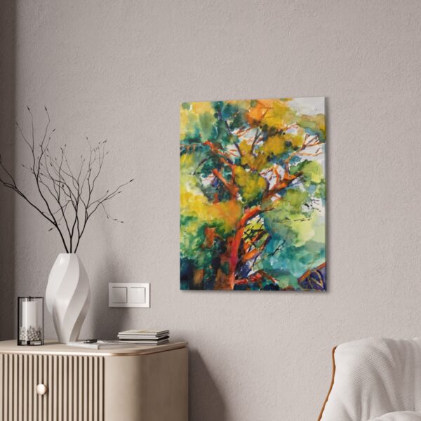 Art by Marina Zavalova. An original "Patriarch" watercolor painting of a vibrant tree with a blend of autumn hues graces a modern living room wall, adding a splash of color and artistic flair to the space.